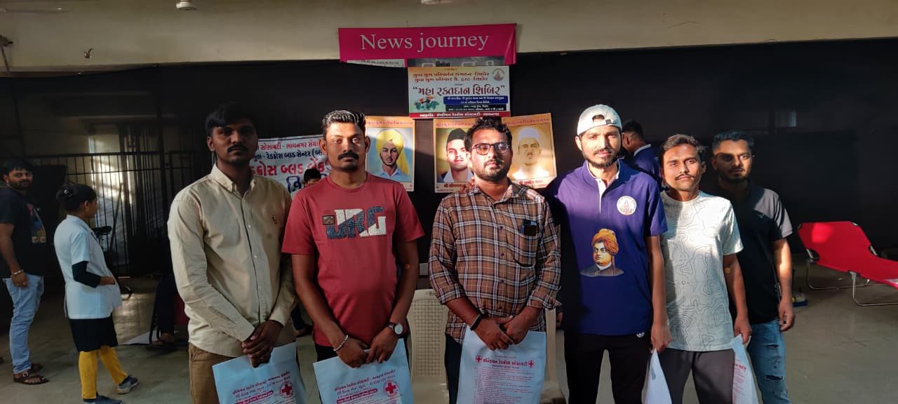 Y.Y.P members with blood donors holding Red Cross bags