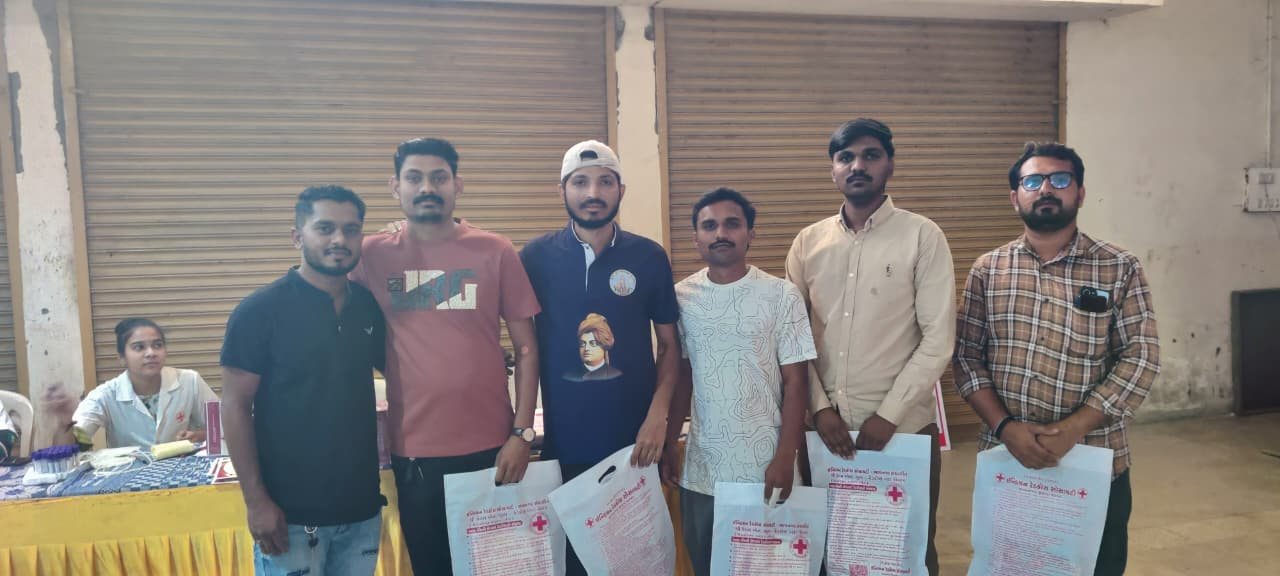 Y.Y.P members and donors with Red Cross bags