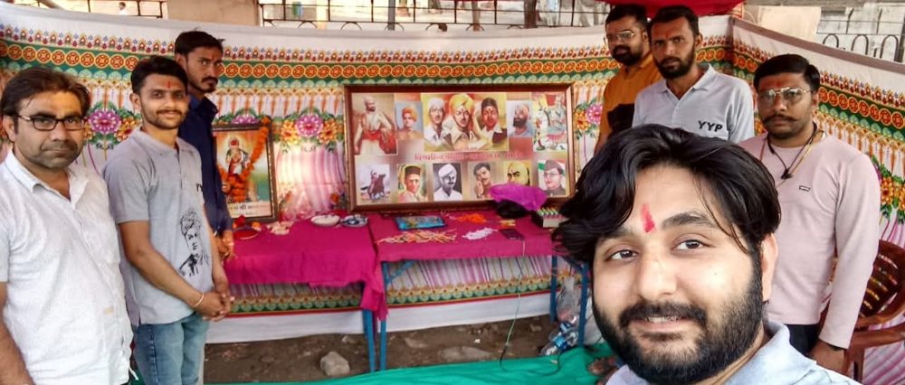Bharat Mata Pujan by Y.Y.P members before portraits of great revolutionaries
