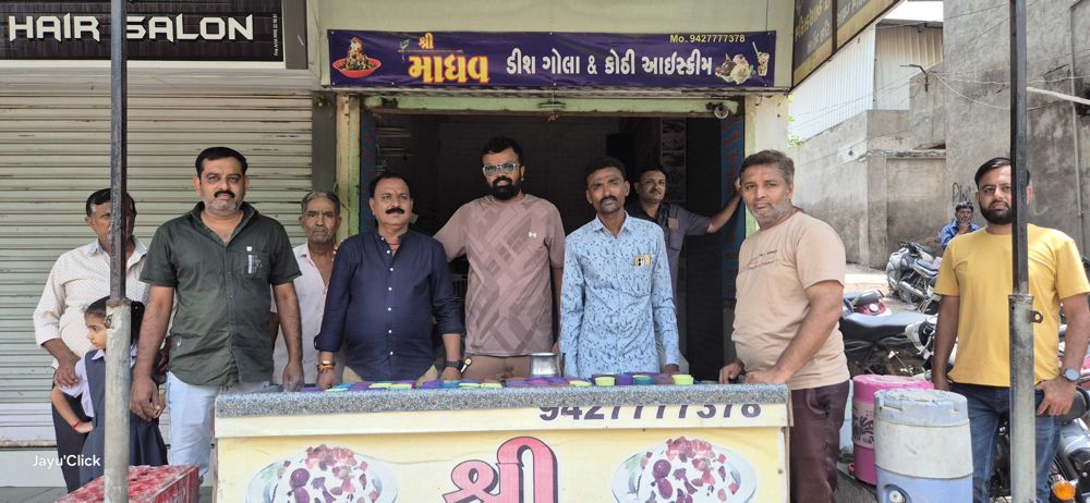 Y.Y.P members with a dish gola sarbat stall in Sihor