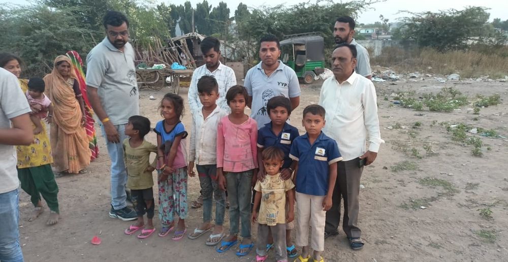 Children with Y.Y.P members in a slum area