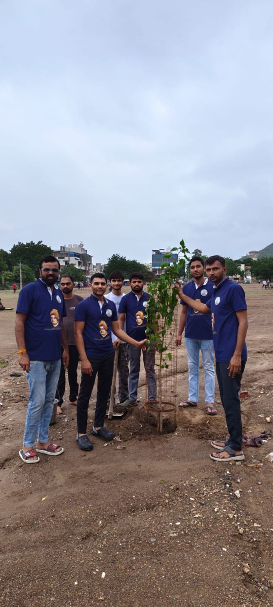 Y.Y.P members planting a sapling